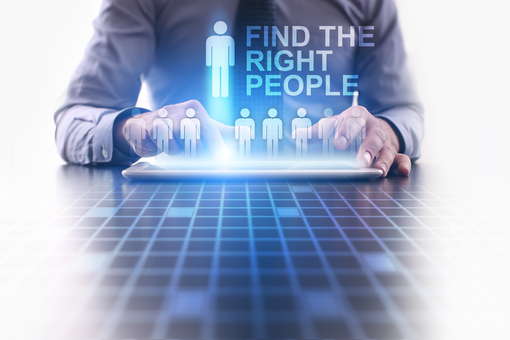 Ask for the writer's portfolio, give writing assignment, and do an interview to see if he or she fits.